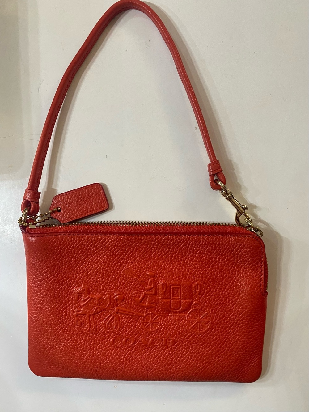 Coach Pebbled Leather Wristlet - Coral